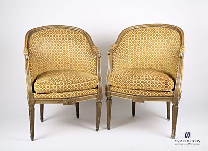 null Pair of bergères in molded wood, carved and lacquered green and gold, the basket...
