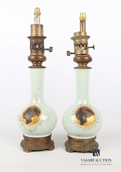 null Pair of celadon earthenware lamp bases, the spherical body decorated with medallions...