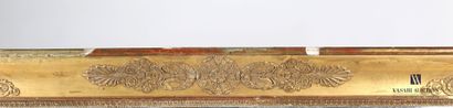 null Rectangular mirror in wood and stucco molded, carved and gilded, decorated with...