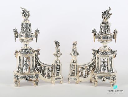 null Pair of silver-plated bronze andirons with a flaming baluster urn decorated...