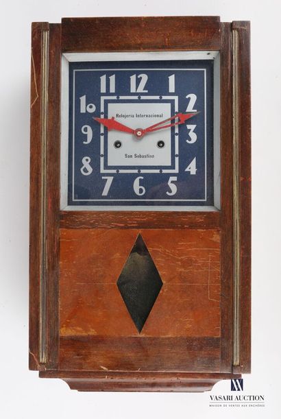 null Chime clock in molded natural wood, the dial marked "Relojeria Internacional...