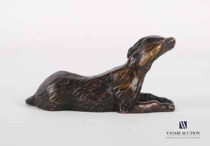 null Sujet en bronze à patine brune figurant un chien assis.

Haut. : 3,5 cm - Prof....