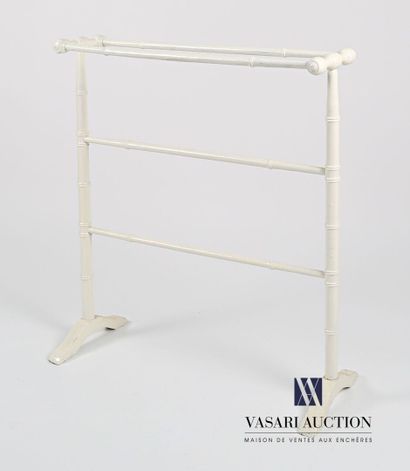 null Towel rack in natural wood with white lacquered mouldings, the uprights simulating...