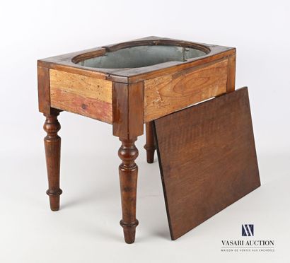 null Wooden bidet frame, the removable tray of rectangular shape discovering a piriform...