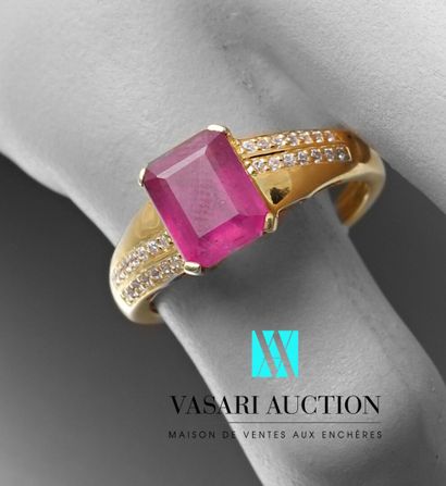 null A vermeil ring set with an emerald-cut ruby and two lines of diamonds.

Gross...