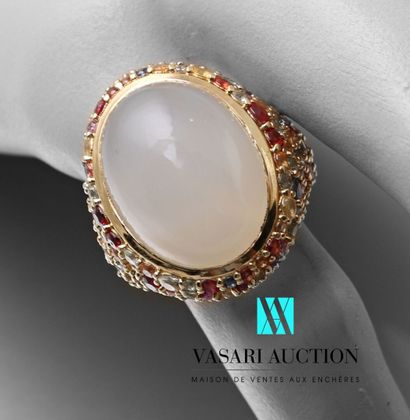 null Gold vermeil ring set with a cabochon moonstone in a circle of multicolored...