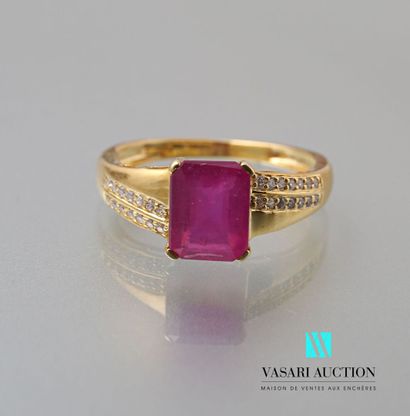null A vermeil ring set with an emerald-cut ruby and two lines of diamonds.

Gross...