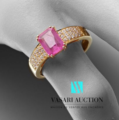 null A vermeil ring centered on an emerald-cut pink sapphire with a pavement of zircons.

Gross...