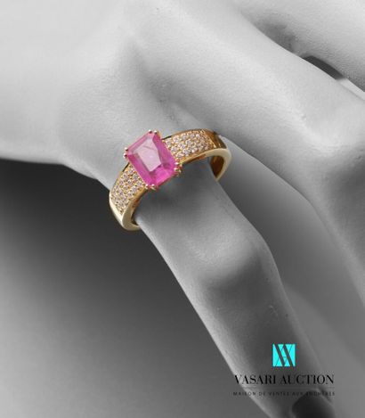 null A vermeil ring centered on an emerald-cut pink sapphire with a pavement of zircons.

Gross...