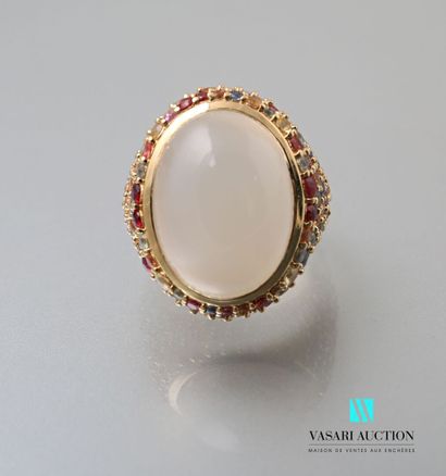 null Gold vermeil ring set with a cabochon moonstone in a circle of multicolored...