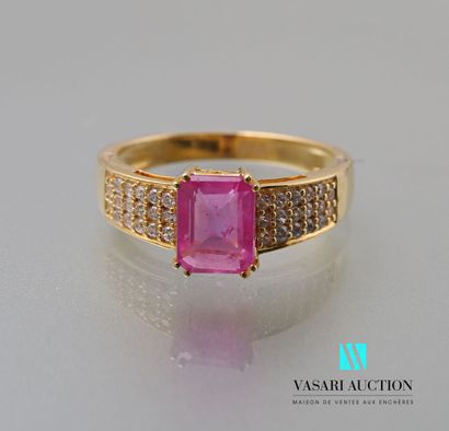 null A vermeil ring centered on an emerald-cut pink sapphire with a pavement of zircons.

Gross...