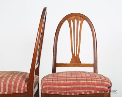 null Pair of mahogany chairs, the curved back decorated with a stylized lyre, they...