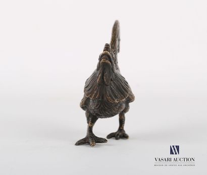 null Subject in bronze with brown patina representing a rooster walking.

Height...