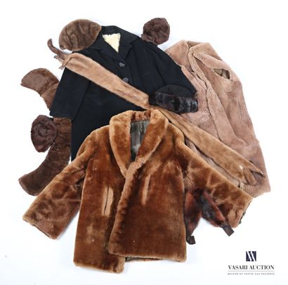 null Lot including a black coat with three large buttons lined, a synthetic fur coat...