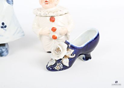 null Lot including two subjects in porcelain "trembleuse" representing a young boy...