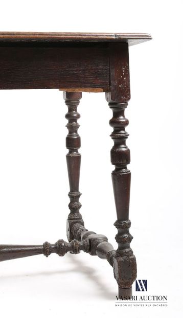 null Molded oak writing table, the rectangular top highlighted by a drawer in the...