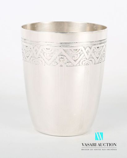 null Silver tumbler with a slightly flared body on a flat base, the body decorated...