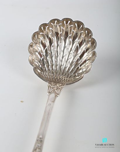 null Silver sprinkling spoon, the handle decorated with a blind cartouche flanked...