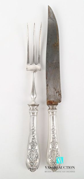 null Cutlery for cutting, the handles in filled silver decorated with a medallion...