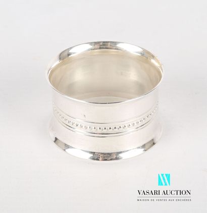 null Round silver napkin ring with flared edges, the body decorated with a frieze...