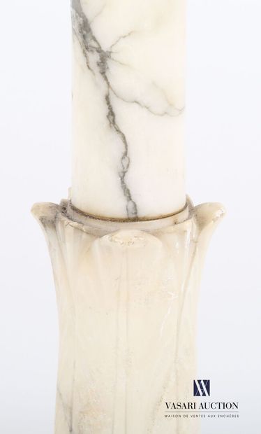 null Lamp stand in white veined marble on a round base decorated with flutes topped...