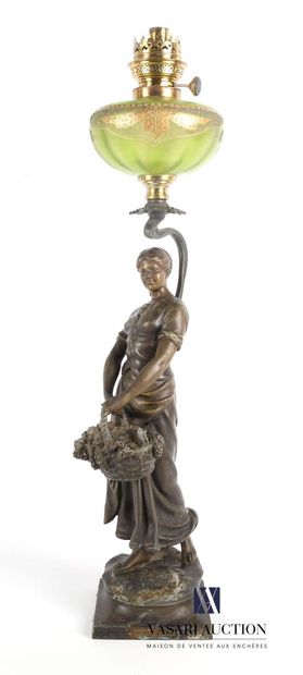 null Lot including a lamp base in patinated regula representing a woman with a fruit...