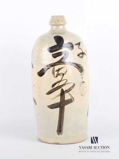 null Cracked ceramic bottle decorated with calligraphic signs

(wears and chips)

Height...
