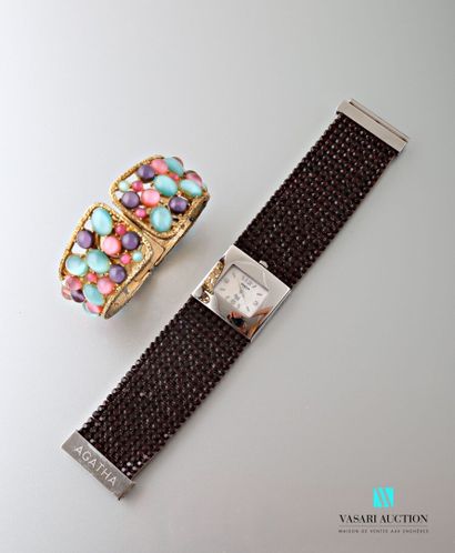 null Lot including a watch brand Cord, the articulated bracelet concealing the dial...
