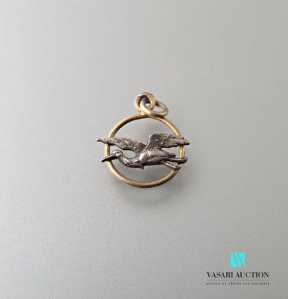 null Charm in vermeil in the shape of circle decorated with a motive of stork in...