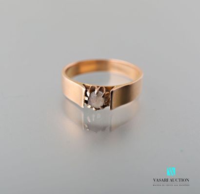 null Ring in pink gold 750 thousandth, flat ring set in the center of a half pearl...