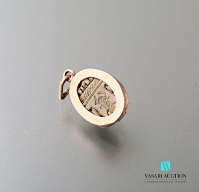 null Charm Souvenir of Egypt, in pink gold 585 thousandths set with an Egyptian scarab...