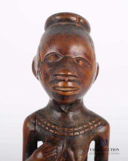 null KONGO

Figure of an ancestor in carved wood representing a woman with her hand...