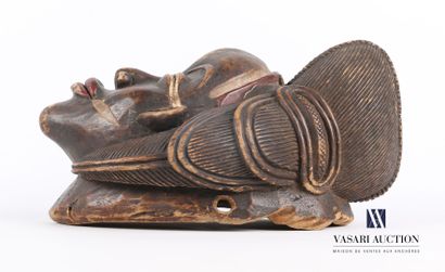 null PUNU - GABON

Black female mask in carved wood with patina and pigment, the...