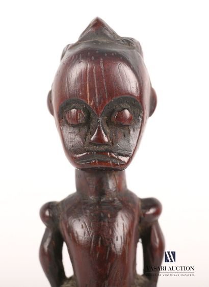 null FANG - GABON

Wooden dagger, the handle carved of a man with his hands joined...