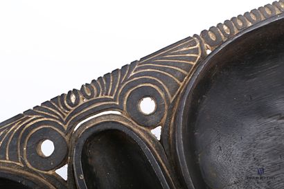 null Dish with three compartments in blackened wood and carved with vermicular motifs,...