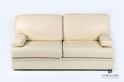 null Sofa two seats in cream leather, the arms slightly recessed.

20th century

(some...