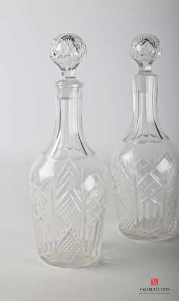 null BACCARAT 

Pair of crystal decanters cut with diamond points and flutes.

Two...