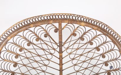 null Headboard in bamboo and rattan of curved form with openwork decoration of scrolls...
