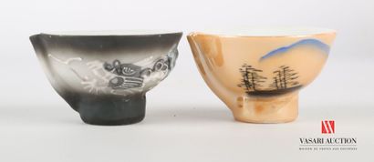 null Set of two polychrome porcelain sake sets including a bottle, a tray and six...