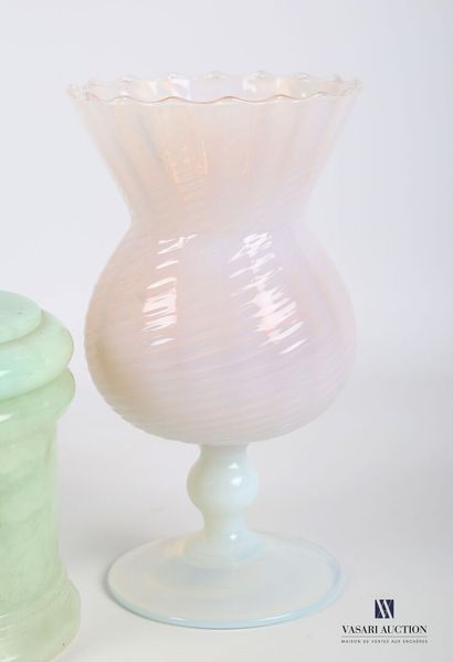 null Lot including a vase in opaline posing on a baluster foot, the body hemmed with...