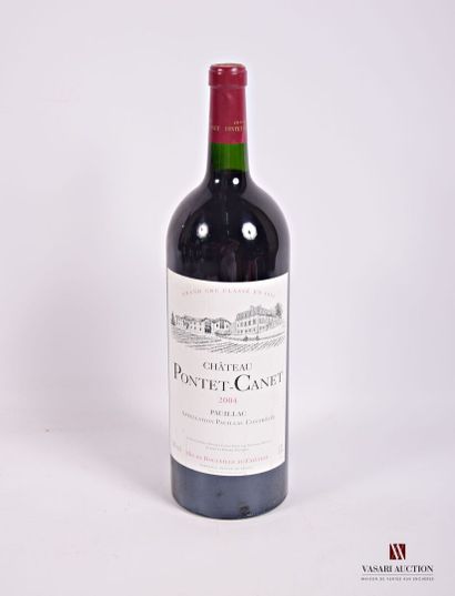 null 1 Magnum	Château PONTET CANET	Pauillac GCC	2004

	Et. légèrement tachée. N :...