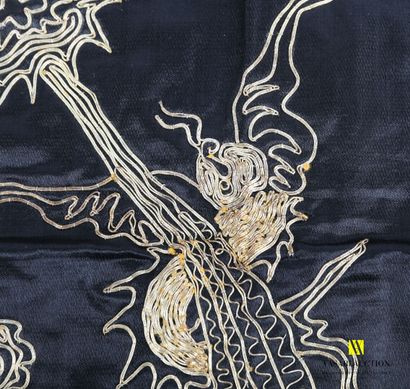 null CHINA

Two embroideries on silk presenting dragons in medallions 

One bearing...