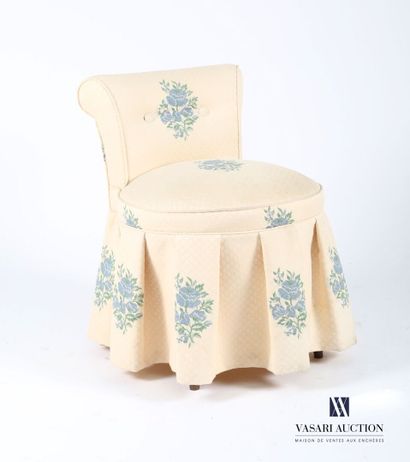 null Dressing table armchair, the reversed back covered with a flowery fabric. It...