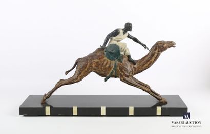 null Subject in patinated regula representing a rider on his galloping dromedary....