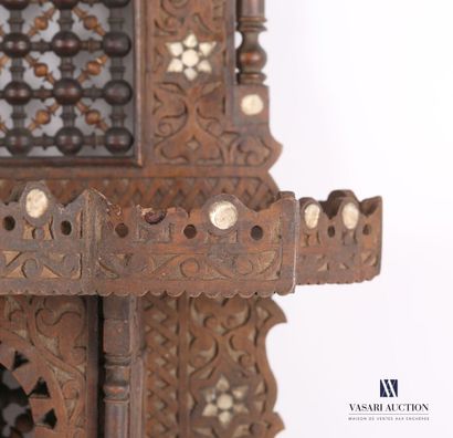 null Shelf of architectural form out of moulded and carved wood and inlays, it presents...
