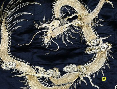 null CHINA

Embroidery on silk presenting a dragon in a medallion in recall in the...