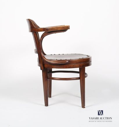 null Office armchair in natural wood molded and curved, the dark back of a cake is...