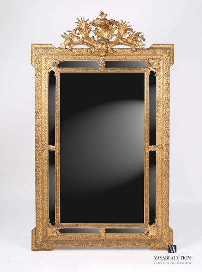 null Mirror with glazes in wood and stucco molded, carved and painted gilded, the...