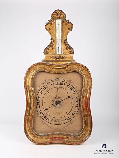null Barometer/thermometer in wood and stucco molded and gilded, the pediment hemmed...