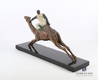 null Subject in patinated regula representing a rider on his galloping dromedary....